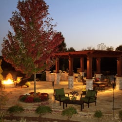 New Seasons Landscaping - Outdoor living space that included a patio, pergola, firepit, bench, plant and tree install.