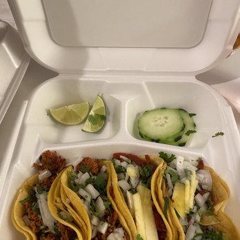 Tacos Junior - 2 chorizo tacos on the left, 2 pastor tacos (with pineapple) on the right - Mexican Near Me - Denver, Colorado