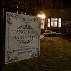 Tangerine Hair Salon - Salon sign only noticeable close up. Make a note where the bus stop is located (directly out front), if you drive