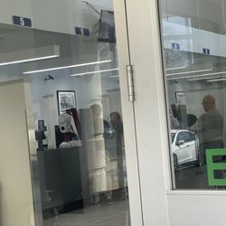 Department of Motor Vehicles - The teller behind #6.