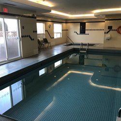 Sandman Hotel Quesnel - Pool and hot tub  both perfect to relax at the end of the day.  Theres also a fenced in sitting area outside just off the  pool room