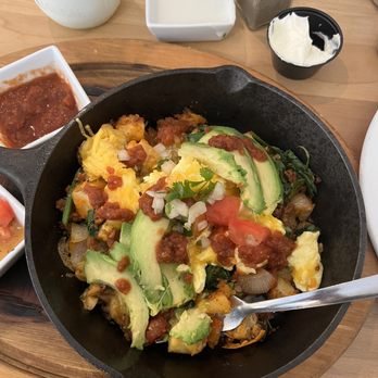 Syrup - Norman - Skillet breakfast (I don't remember the real name of it on the menu). Delicious! **note** I added the avocado, it is extra $. - Breakfast & Brunch Near Me - Norman, Oklahoma Syrup - Norman - Skillet breakfast (I don't remember the real name of it on the menu). Delicious! **note** I added the avocado, it is extra $. - Breakfast & Brunch Near Me - Norman, Oklahoma