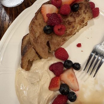 Wolf's Ridge - Half of the French toast (good caramel creme; if you ask for syrup, they charge an extra $2!) - New American Near Me - Worthington, Ohio
