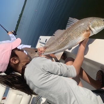 Tyjo Knot Charters - Releasing a red - Tours Near Me - Mount Pleasant, South Carolina