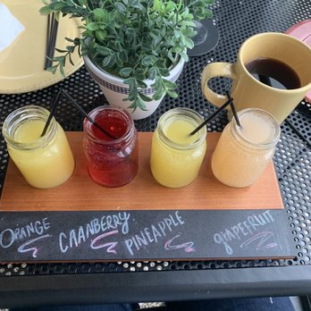 Redberry - Mini (4 oz) mimosa flight.  Grapefruit was my pick as far as flavor goes. Other juices weren't top shelf juices at all. - Breakfast & Brunch Near Me - Troy, Ohio