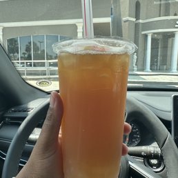 Peach passion fruit jasmine green tea with lychee popping bubbles