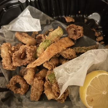 Ray's In the City - Atlanta - Calamari on hot platter. This portion is less than half of what's served in restaurant. - Seafood Near Me - Atlanta, Georgia Ray's In the City - Atlanta - Calamari on hot platter. This portion is less than half of what's served in restaurant. - Seafood Near Me - Atlanta, Georgia