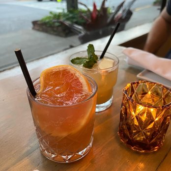 Cinnamon - two cocktails on a wooden table - Indian Near Me - Rhinebeck, New York Cinnamon - two cocktails on a wooden table - Indian Near Me - Rhinebeck, New York