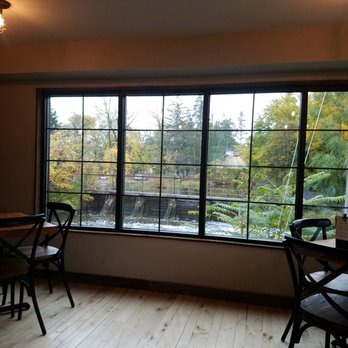 Britesmith Brewing - Williamsville - View of creek from inside - Pizza Near Me - Williamsville, New York Britesmith Brewing - Williamsville - View of creek from inside - Pizza Near Me - Williamsville, New York