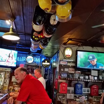 Collins Tavern - Former fireman owns the Tavern, retired fireman hang their hats above. - Bars Near Me - West Springfield, Massachusetts
