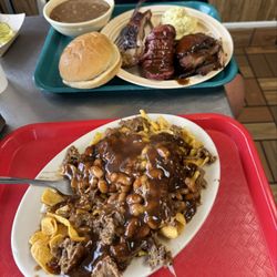 Crazy Larry's Pit Bar-B-Que - Frito pie- Red plate   Ribs, Brisket, Sausage, Potato Salad, Beans- Green plate