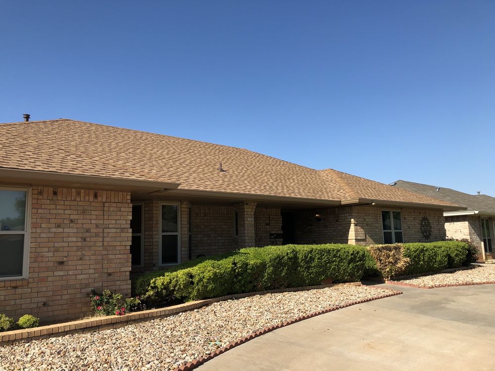 Slide of Hartman Roofing