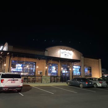 Double Dogs - a parking lot at night - Sports Bars Near Me - Greenville, South Carolina