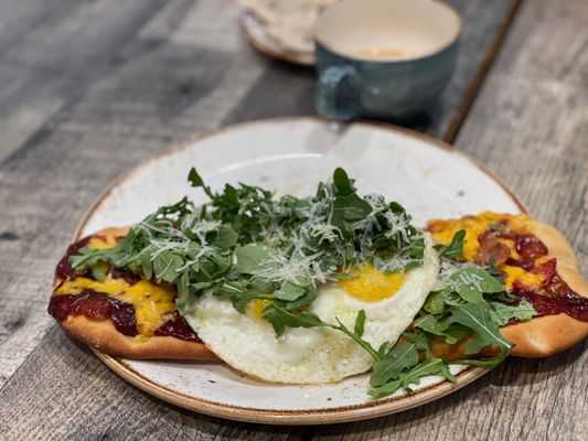 Photo of The Aussie Grind - Frisco, TX, US. Breakfast Pizza, surprisingly tasty! Yes, totally works.