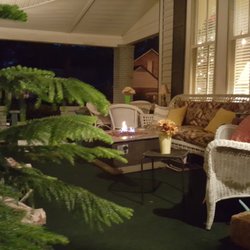 Baker Street Bed and Breakfast - Front porch in the evening with fire pit to enjoy..