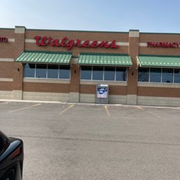 the front of a walgreens store the front of a walgreens store