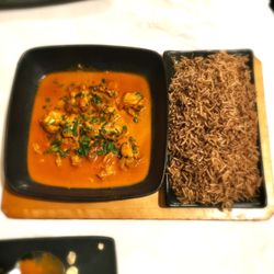 Uzbekistana - Noqrai chicken (boneless chicken thigh cooked in a traditional way with yogurt, milk, nuts, served with rice or nan)