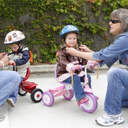 Cliff Drive Care Center - Getting ready to ride our trikes!