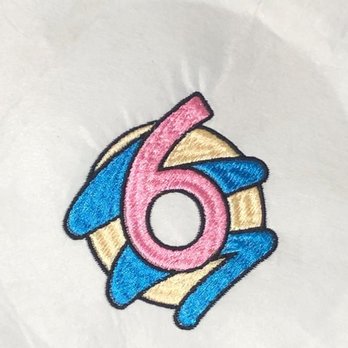 Toronto Embroidery - 6 in a donut embroidered multicolour design on white fabric - Embroidery & Crochet Near Me - Vaughan, Ontario Toronto Embroidery - 6 in a donut embroidered multicolour design on white fabric - Embroidery & Crochet Near Me - Vaughan, Ontario
