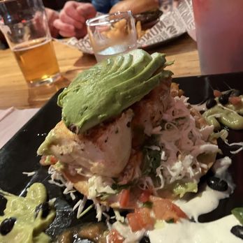 Nook - Halibut Toatada. Huge piece of fish. It usually comes with cheese on top which I did not have. - Bars Near Me - Santa Barbara, California Nook - Halibut Toatada. Huge piece of fish. It usually comes with cheese on top which I did not have. - Bars Near Me - Santa Barbara, California