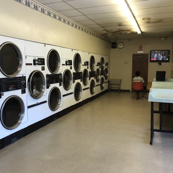 Jiffy Clean Laundry - Other side, TV, dryers, folding tables - Laundry Services Near Me - Boise, Idaho Jiffy Clean Laundry - Other side, TV, dryers, folding tables - Laundry Services Near Me - Boise, Idaho