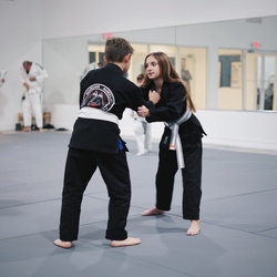 Marcus Aurelio Jiu-Jitsu Academy - Black Belt Club Kids learning while practicing drills.