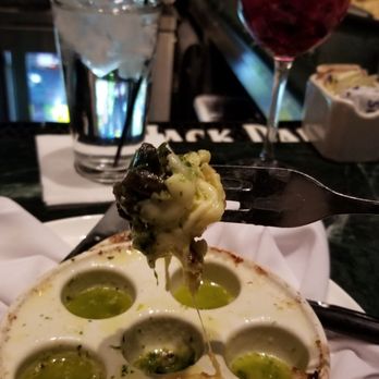 M's Pub - Baked dish with escargot - New American Near Me - Omaha, Nebraska M's Pub - Baked dish with escargot - New American Near Me - Omaha, Nebraska
