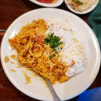 Jerusalem Grill - Rice, orange on the left and basmati and vermicelli on the right - Mediterranean Near Me - San Antonio, Texas Jerusalem Grill - Rice, orange on the left and basmati and vermicelli on the right - Mediterranean Near Me - San Antonio, Texas