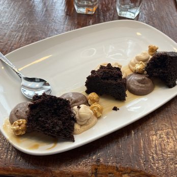 Boca - Boca Chocolate dark chocolate cake, milk chocolate ganache, peanut butter mousse, salted caramel, candied popcorn - Bars Near Me - Winter Park, Florida Boca - Boca Chocolate dark chocolate cake, milk chocolate ganache, peanut butter mousse, salted caramel, candied popcorn - Bars Near Me - Winter Park, Florida