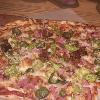 BJ's Restaurant & Brewhouse - The Spicy Pig Tavern-Cut Pizza - New American Near Me - Murfreesboro, Tennessee