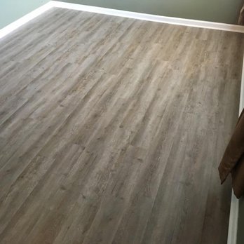 Tesoro Floor Covering - Master bedroom with laminate with water proof backing - Carpet Installation Near Me Tesoro Floor Covering - Master bedroom with laminate with water proof backing - Carpet Installation Near Me