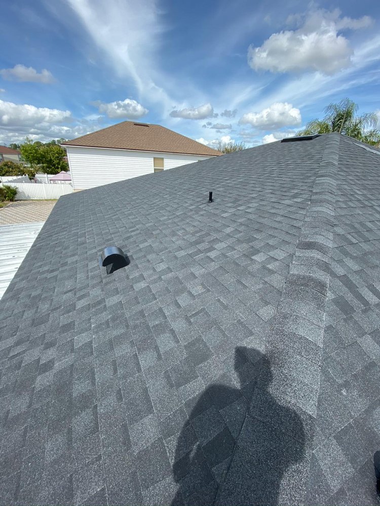 Slide of A2M Roofing