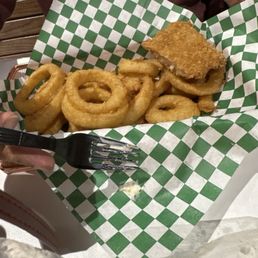 Fried fish and onion rings and seafood in a bag (meal #1, shrimp, clams, sausage, corn and potatoes) Fried fish and onion rings and seafood in a bag (meal #1, shrimp, clams, sausage, corn and potatoes)