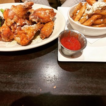 The Iron Rail - Garlic parmigiana wings and Greek fries - New American Near Me - New Milford, Connecticut The Iron Rail - Garlic parmigiana wings and Greek fries - New American Near Me - New Milford, Connecticut