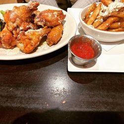 The Iron Rail - Garlic parmigiana wings and Greek fries