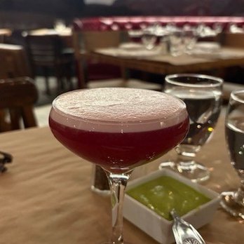 Pio Pio 8 - Peruvian Kiss : pineapple infused Pisco, homemade purple corn juice, lemon juice and egg whites. Delish! - Latin American Near Me - New York, New York