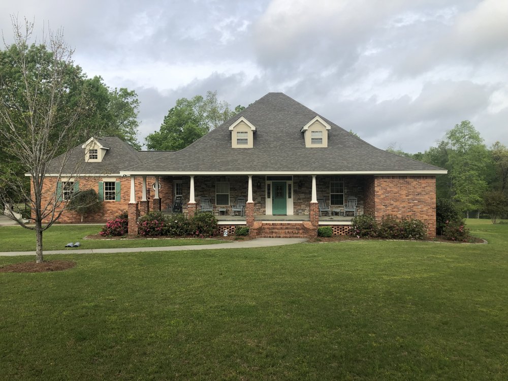 Slide of Southpaw Roofing