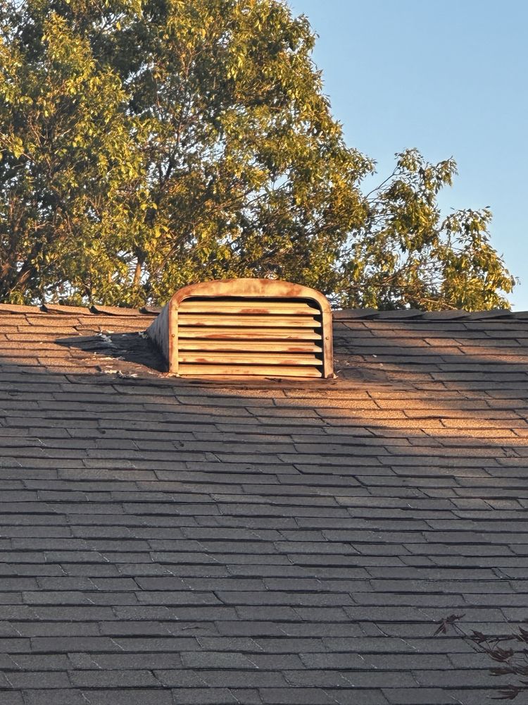 Slide of Maginis Roofing