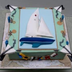 Silver Cloud Cakes - This half hull of a 44' Bristol is a copy of the vessel owned by a sailing couple celebrating their 12th anniversary.
