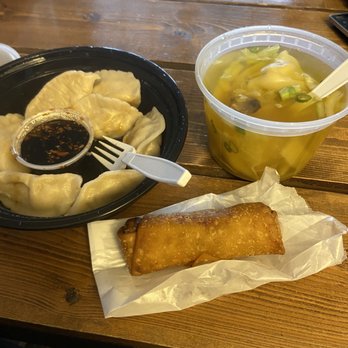 New China Express - a plate of dumplings and a bowl of soup - Chinese Near Me - Westerville, Ohio