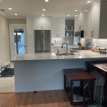 Grace Kitchen Cabinets - Perfect fit of refrigerator and managed to add broom closet too. - Cabinetry Near Me - San Pedro, California