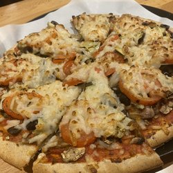 Pizza 9 - Veggie Delight Pizza, vegan on gluten free (also vegan) crust with no bell peppers or onions and added artichokes.  Also: Daiya cheese.