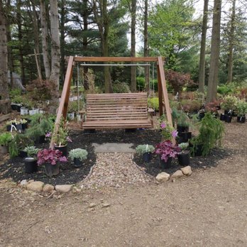 Thee Tree Farm - a swing surrounded by plants - Landscaping Near Me - Watsontown, Pennsylvania Thee Tree Farm - a swing surrounded by plants - Landscaping Near Me - Watsontown, Pennsylvania