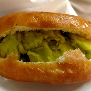 Novel Ice Cream - Donut ice cream sandwich with Ecto Cooler ice cream - Desserts Near Me - Phoenix, Arizona