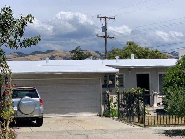 Slide of Lanuza Roofing