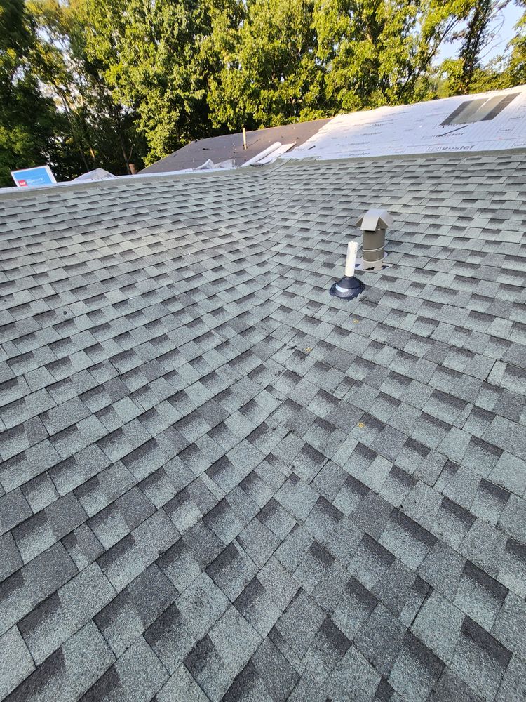 Slide of Marshall Roofing and Remodeling