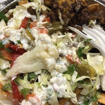 Damn Good Nachos - More beef nacho. - Food Trucks Near Me