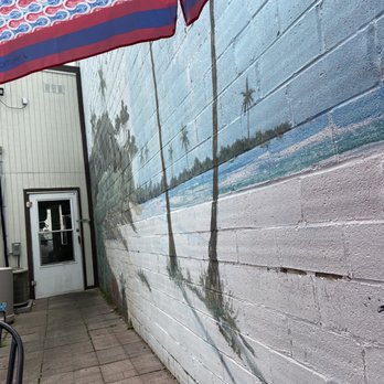 Sam's Deli & Grill - a mural of a palm tree - Delis Near Me - Birmingham, Alabama Sam's Deli & Grill - a mural of a palm tree - Delis Near Me - Birmingham, Alabama