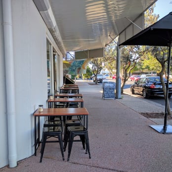 Compound Surf & Espresso - outside during a lull. There's usually at least someone out here. - Coffee & Tea Near Me - Coolum Beach, QLD