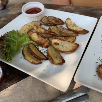 VegiOasis - Oven Baked Potato Wedges - Vegan Near Me - Huntington Beach, California VegiOasis - Oven Baked Potato Wedges - Vegan Near Me - Huntington Beach, California